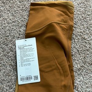 Lululemon Nulu Colour Black Tight 25”